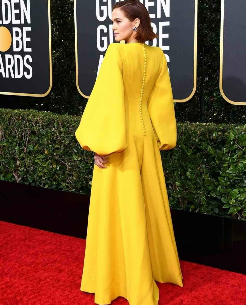 Zoey Deutch's 2020 Globes Golden Dress é verdadeiramente uma obra-prima de ouro