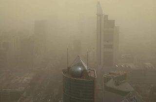 China: tempestade de areia e poluição