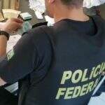Policial federal durante cumprimento da mandado na ação contra cigarreiros