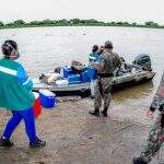 Enviadas por barco, doses da Coronavac chegam a aldeia do Pantanal