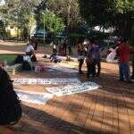SOS Cultura faz cortejo com velas simbolizando a morte da cultura de Campo Grande