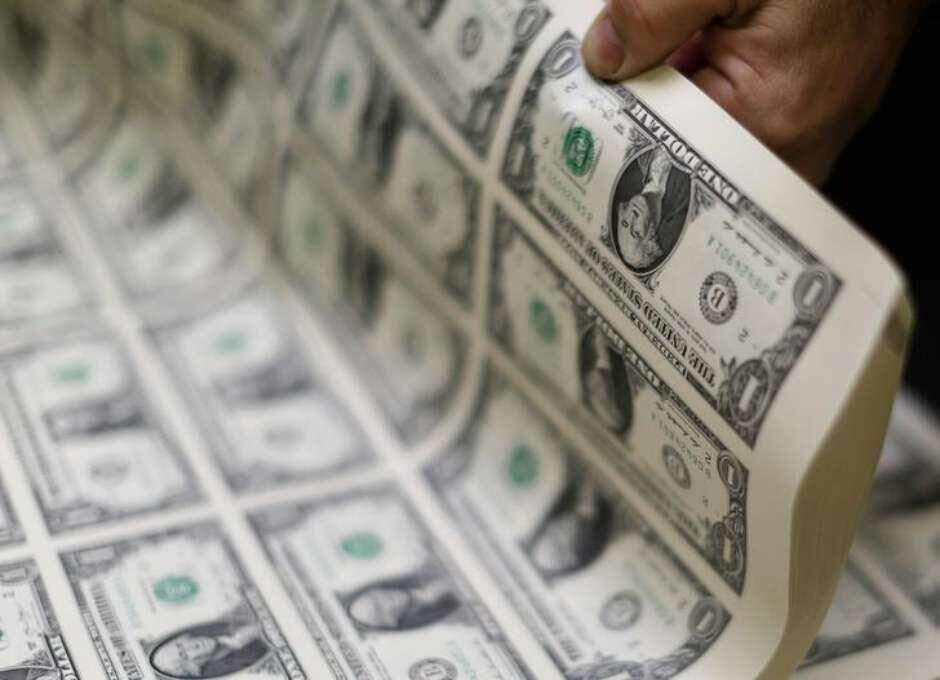 Dólar sobe e encosta em R$ 3,10 por expectativas com Fed