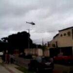 Helicóptero da polícia chama a atenção de moradores durante operação
