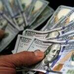 Dólar fecha em alta após anúncio de cortes do governo