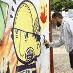 Artistas grafitam muro de Quartel dos Bombeiros em parceria pela arte de rua