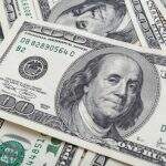 Dólar fecha em leve alta, em dia de inflação nos EUA e reforma tributária