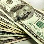 Dólar tem dia volátil, mas encosta em R$ 5,00 com otimismo por reformas