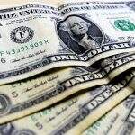 Ajuste pós-feriado, commodities e tensão política local levam dólar a R$ 5,14