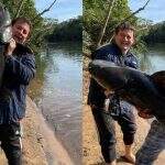 Pai e filho fazem a ‘festa’ após pescarem peixe do tamanho de uma pessoa com 60 kg em MS