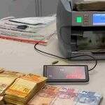 Operação contra esquema de documentos falsos no Detran-MS apreendeu R$ 150 mil